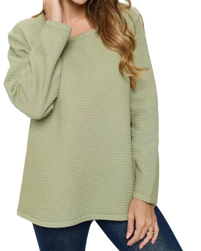 Front of a model wearing a size L Medium Weight Waffle Top in Olive Branch in Olive Branch by Focus Fashion. | dia_product_style_image_id:333413